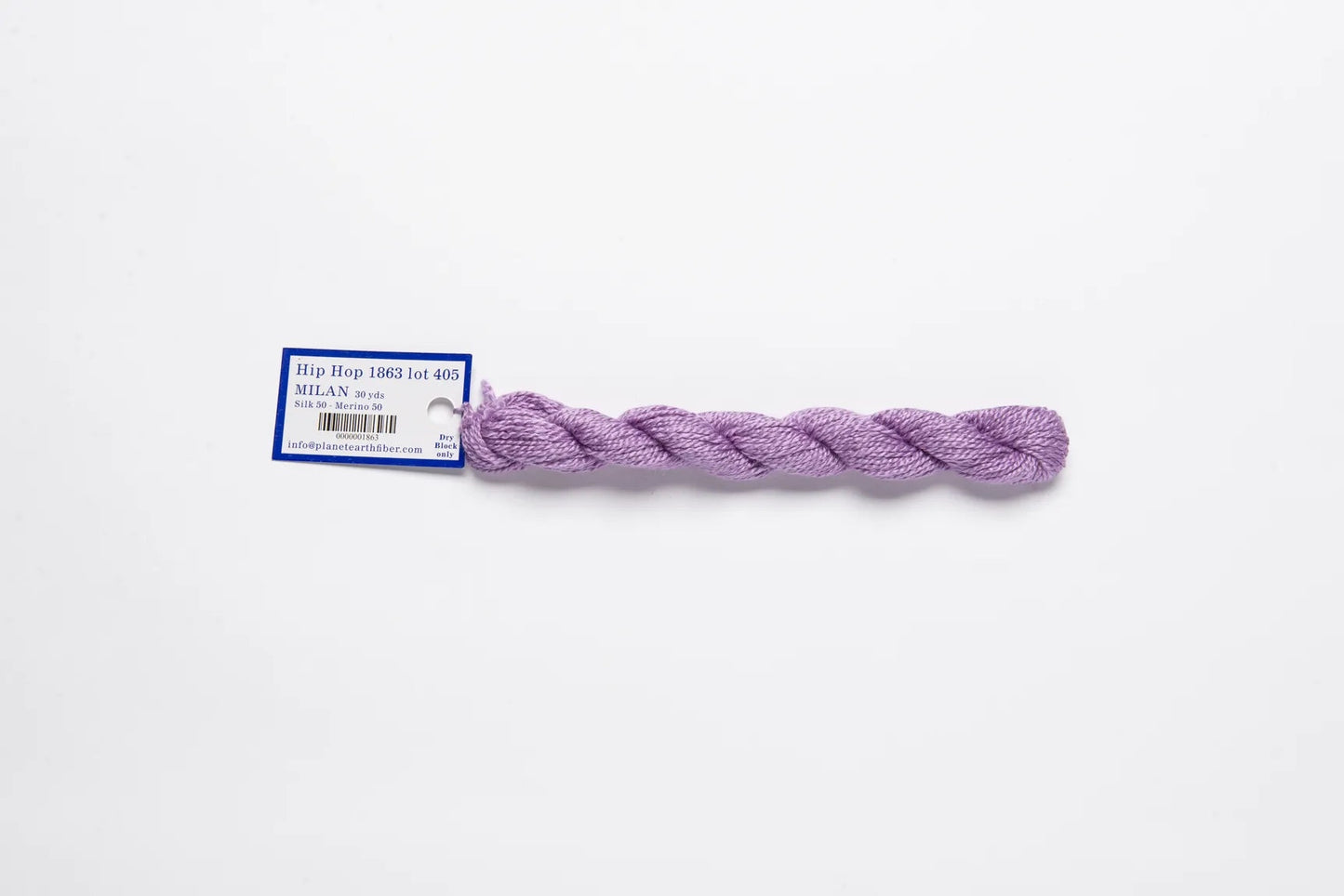 Atlantic Blue Canvas Tilli Tomas Milan Skein in Hip Hop 1863, a lavender silk and merino wool blend yarn.