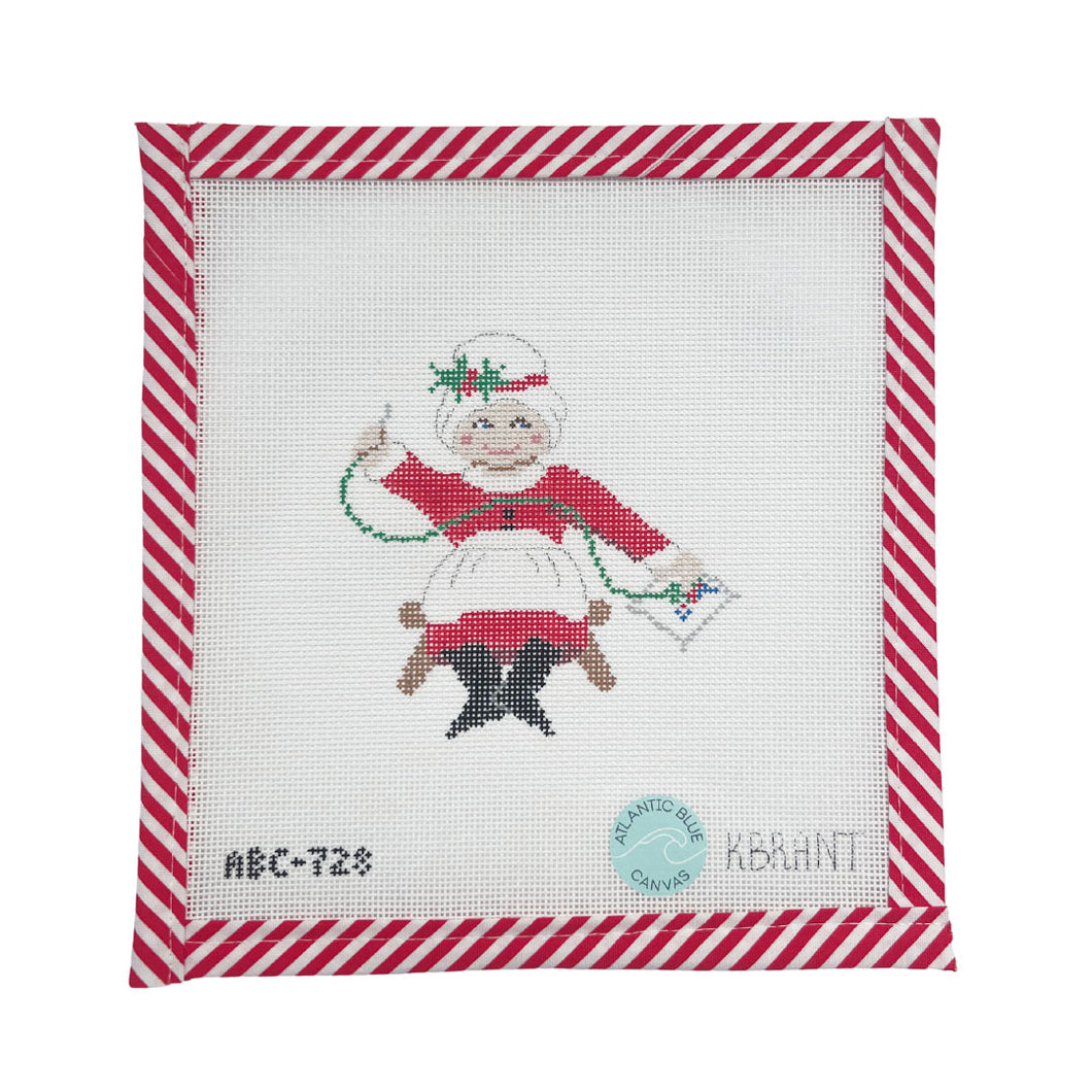 Needlepointing Mrs. Claus
